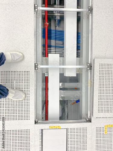 vendor working at raised floor at clean room