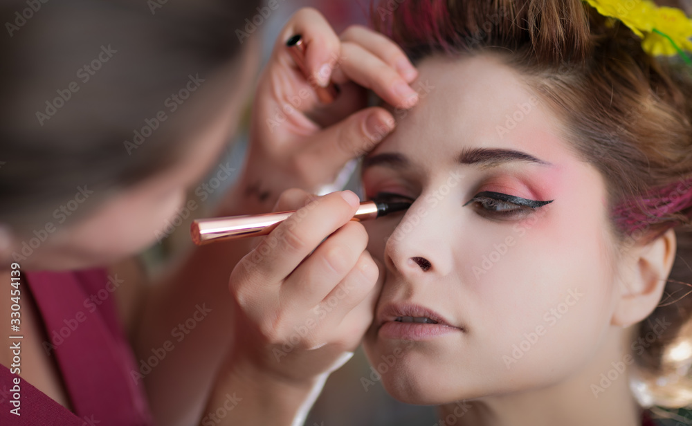 Portrait of a beautiful woman in beauty salon