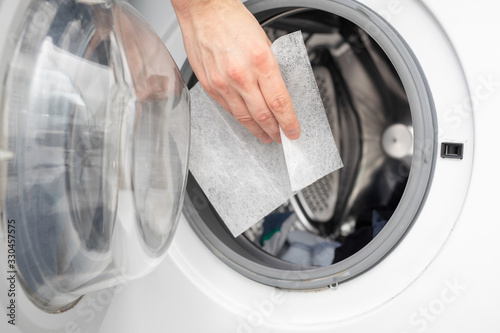 soft your laundry by droping dryer sheets into your dryer or washing mashine photo