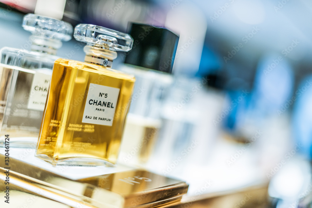 Bottles of Chanel No. 5 perfume on a store shelf Stock Photo