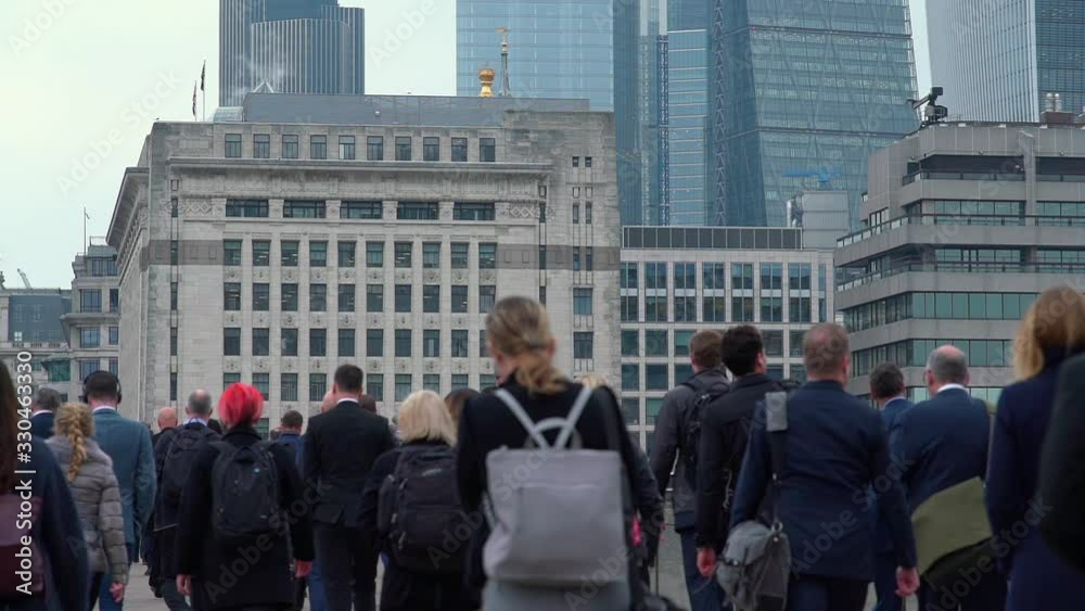 Crowd of pedestrian commuters in London on cool morning in slow motion. Clip 02b Crowd of pedestrian commuters in London on cool morning in slow motion. Clip 02b