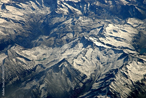 Top view of the Italian Alps with snowy mountain peaks © Art Johnson