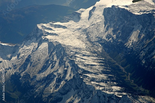 Top view of the Italian Alps with snowy mountain peaks