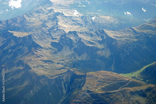 Top view of the Italian Alps with snowy mountain peaks