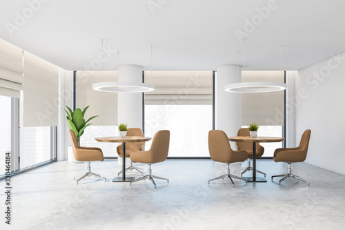White office lounge area with beige chairs © ImageFlow
