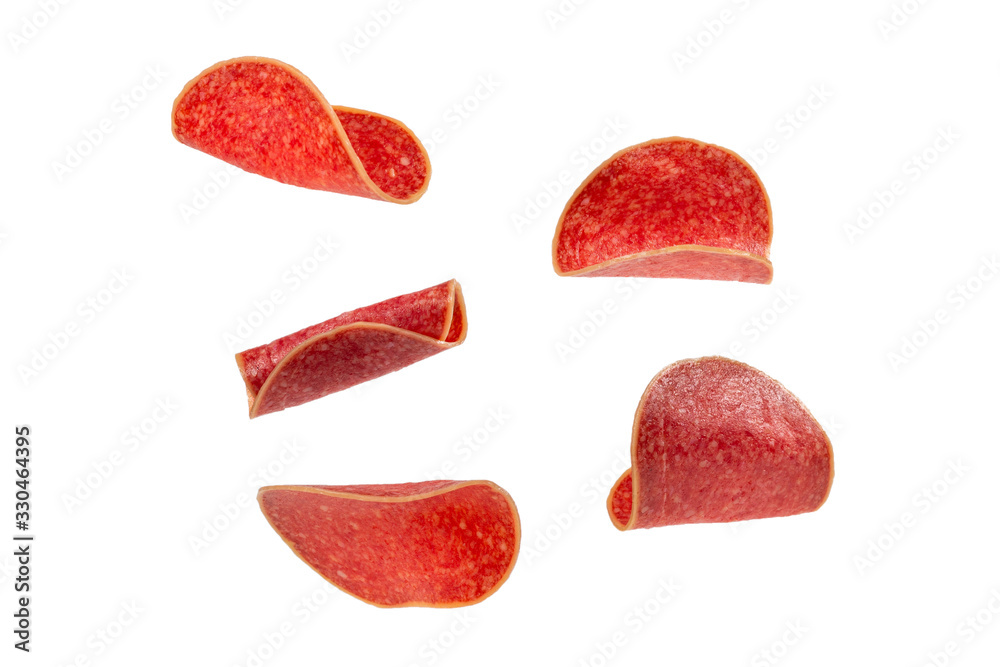 Falling salami isolated on white background. Falling salami isolated on white background.