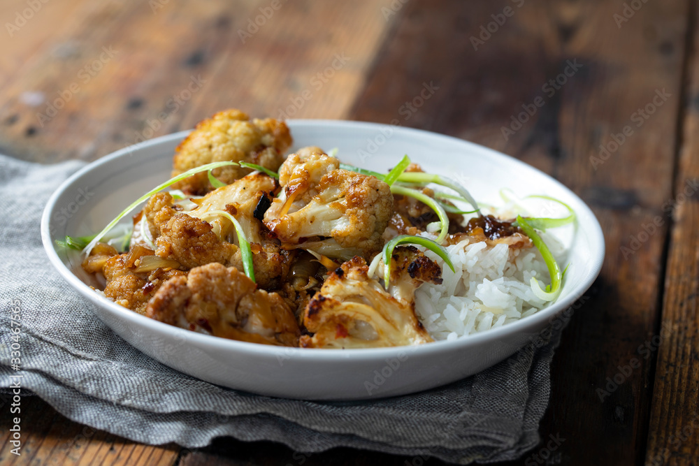 Roast cauliflower with adobo sauce and rice Roast cauliflower with adobo sauce and rice