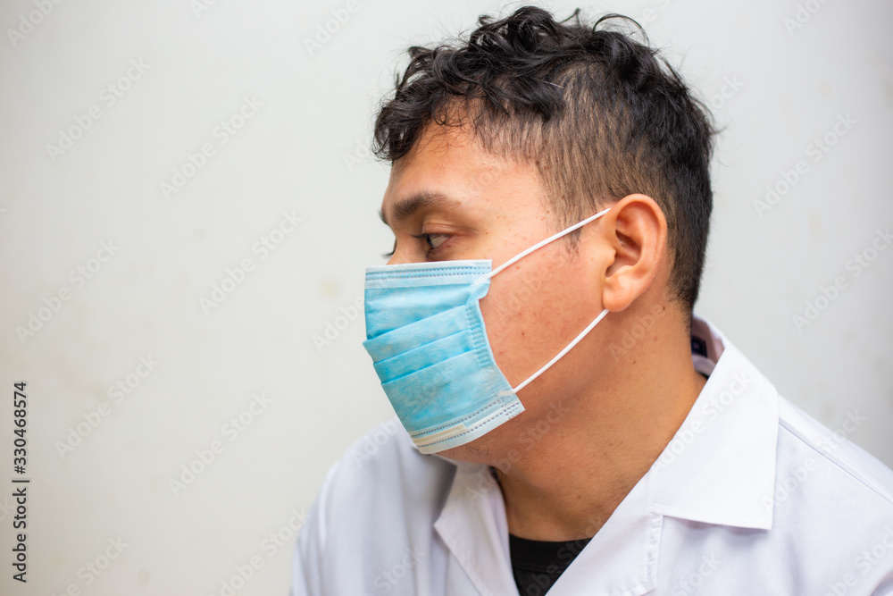 Asian man wearing N95 mank protect from Covid19 and Pm2.5 on white background