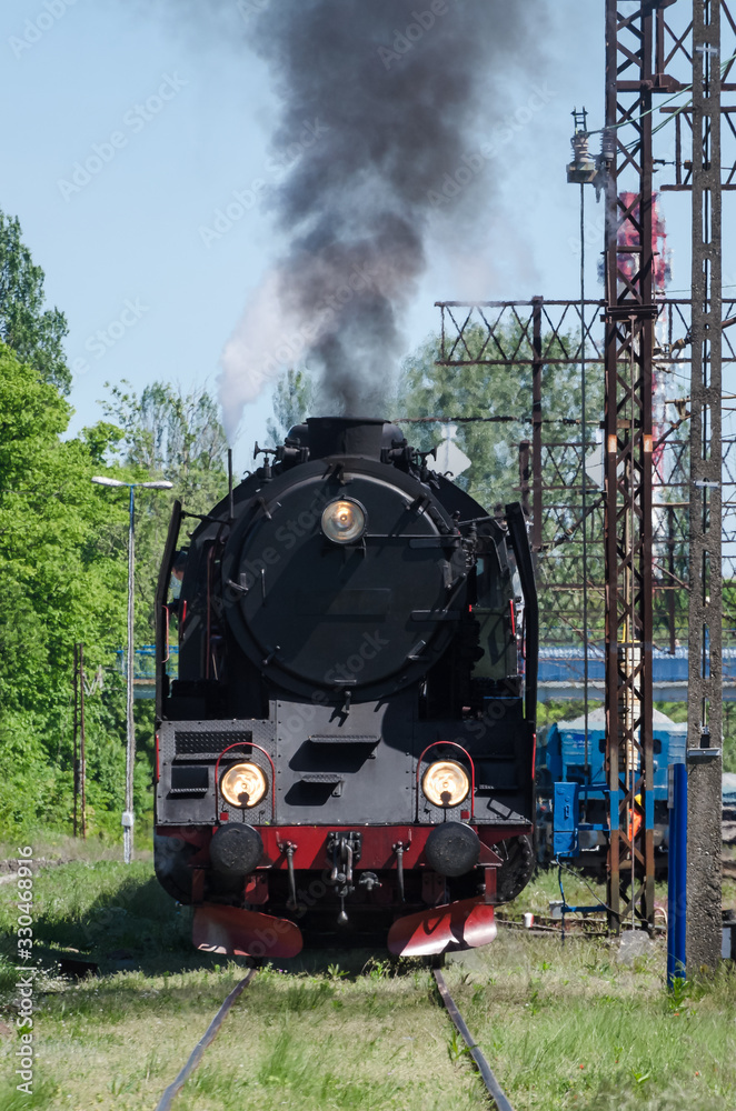 Fototapeta premium STEAM LOCOMOTIVE - Historic machine on a railway siding