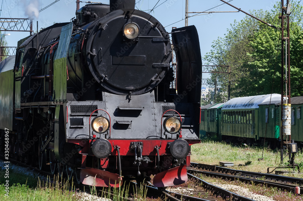 Naklejka premium STEAM LOCOMOTIVE - Historic machine on a railway siding