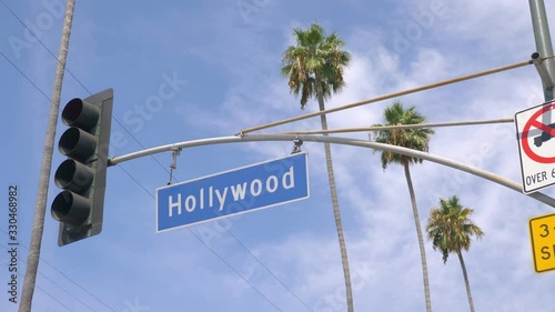 Hollywood boulevard street sign and traffic lights in 4k in slow motion 60fps