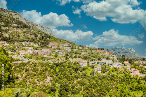 Many homes on a hillside overlooking Eze, France © dbvirago