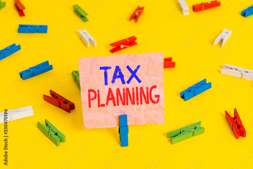 Handwriting text Tax Planning. Conceptual photo man of financial situation or plan from a tax perspective Colored clothespin papers empty reminder yellow floor background office