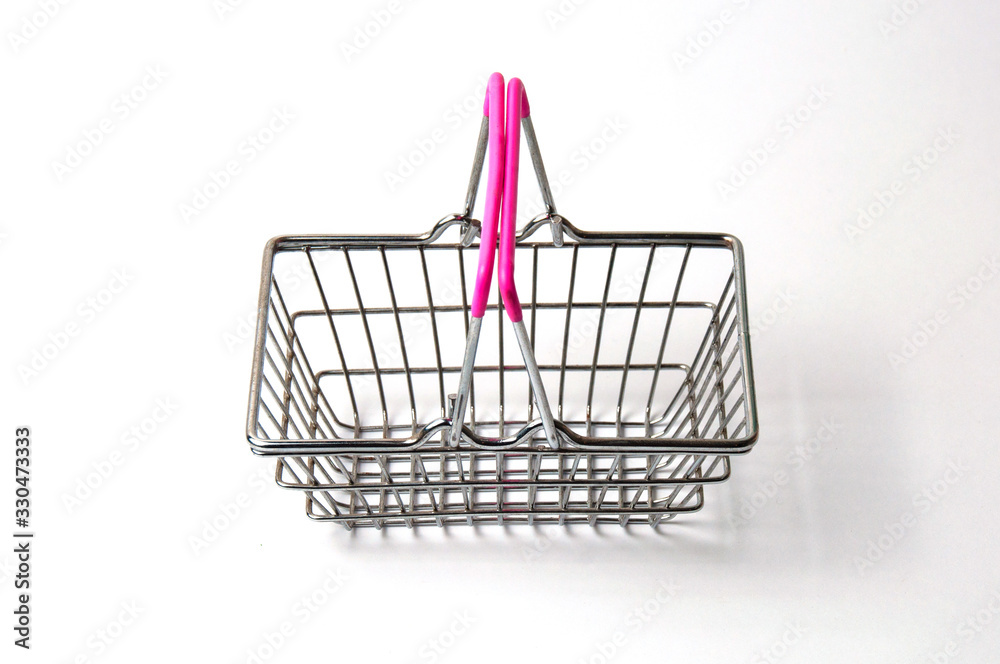 Shopping basket isolated on a white background. Concept discounts, purchase or sale of goods Shopping basket isolated on a white background. Concept discounts, purchase or sale of goods