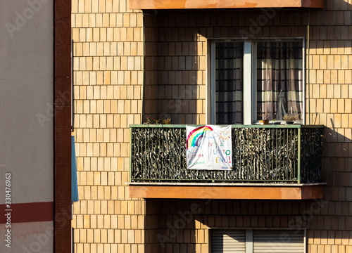 Coronavirus Italy in quarantine with manifesto of hope on balcony photo