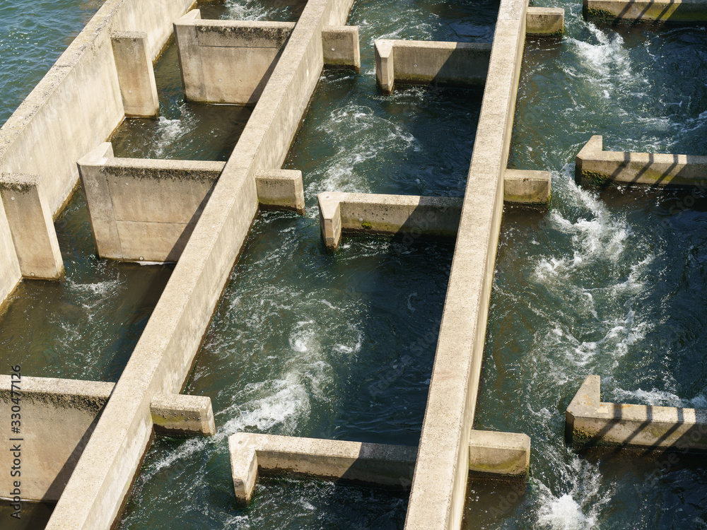 Photography of dam in Koblenz. River water boils and foams. View from above / top view. Photography of dam in Koblenz. River water boils and foams. View from above / top view.