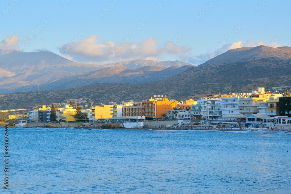 Picturesque view of harbor of resort village Hersonissos, Greek island of Crete