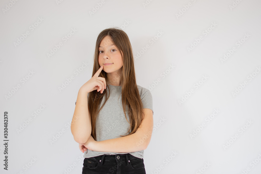 Girl with long hair thinking Girl with long hair thinking