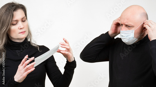 People in medical masks on ...