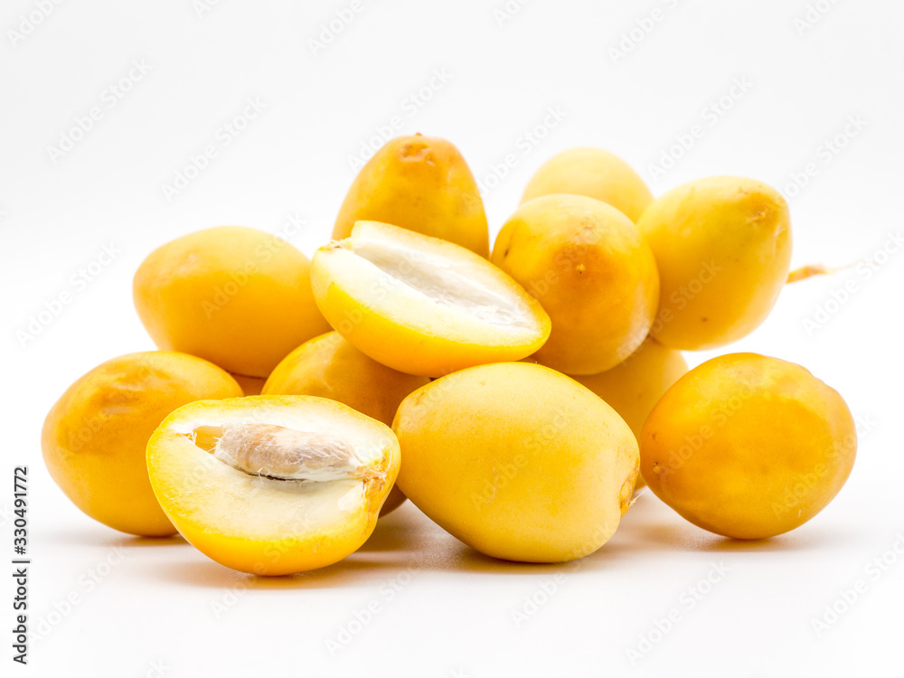 golden dates on white background golden dates on white background