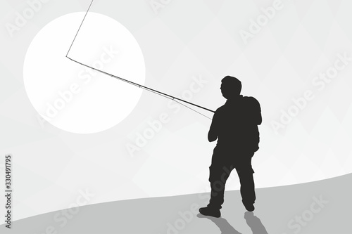 Silhouette of a fisherman with a backpack and spinning. A fisherman catches a fish