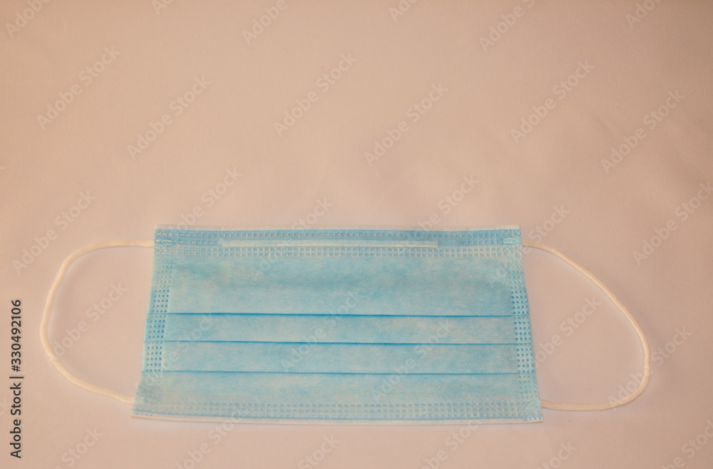 blue coronavirus mask with white background, copy-space blue coronavirus mask with white background, copy-space