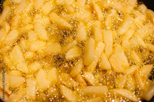 Potato chips close-up. Unhealthy food. Typical American food. Colorful food background