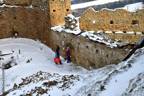 Tourist watching on old historical walls and historic castle in the countryside Zborov Slovakia photo