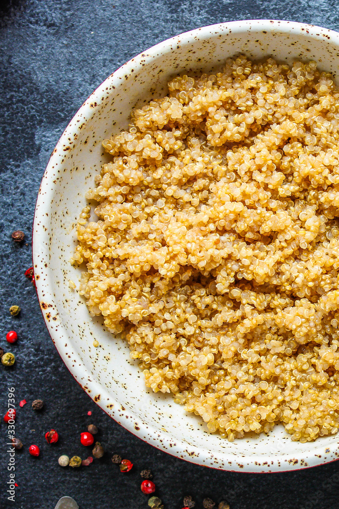 Cooked quinoa, boiled cereal porridge (healthy diet eating) menu concept background. top view. copy space for text