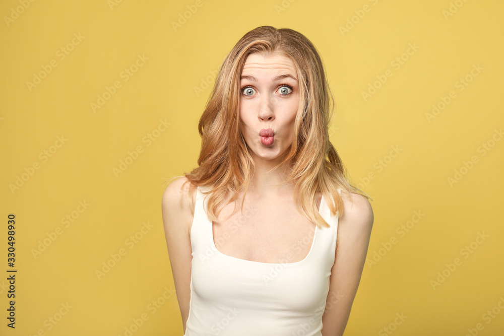 Funny woman on yellow background Funny woman on yellow background