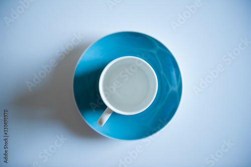 blue cup on white background