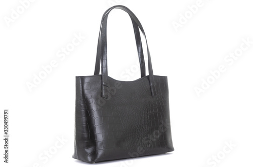 expensive black leather women bag on a handle isolated on a white background