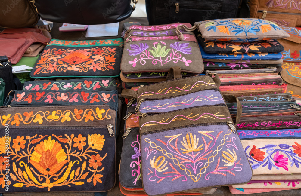 Handmade embroidered handbags for sale at handicraft market