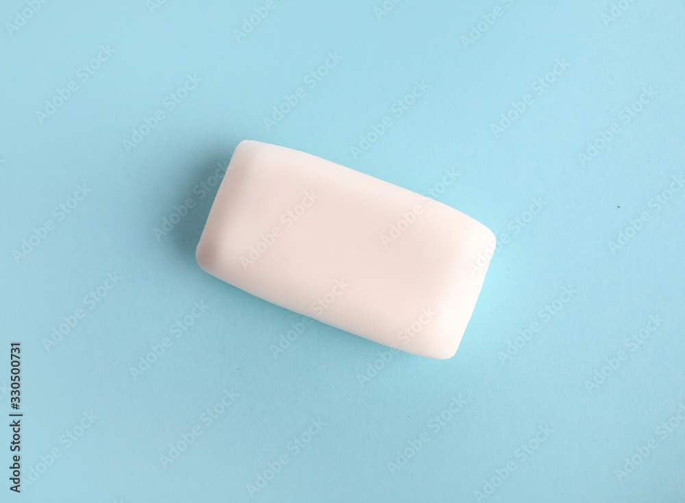 Natural soap on a blue background. Care and hygiene concept Natural soap on a blue background. Care and hygiene concept