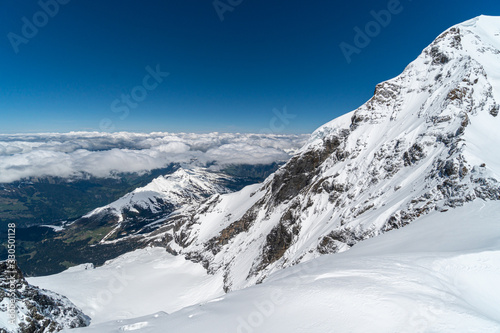 Photography Panoramic view on winter snowy mountains at nice sunny evening.