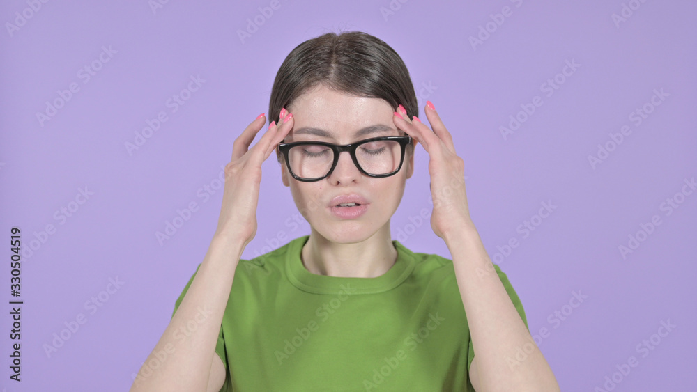 The Tired Young Woman having Headache on Purple Background The Tired Young Woman having Headache on Purple Background