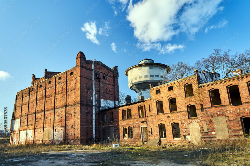 Ruin of red brick industrial buildings in Poznan.