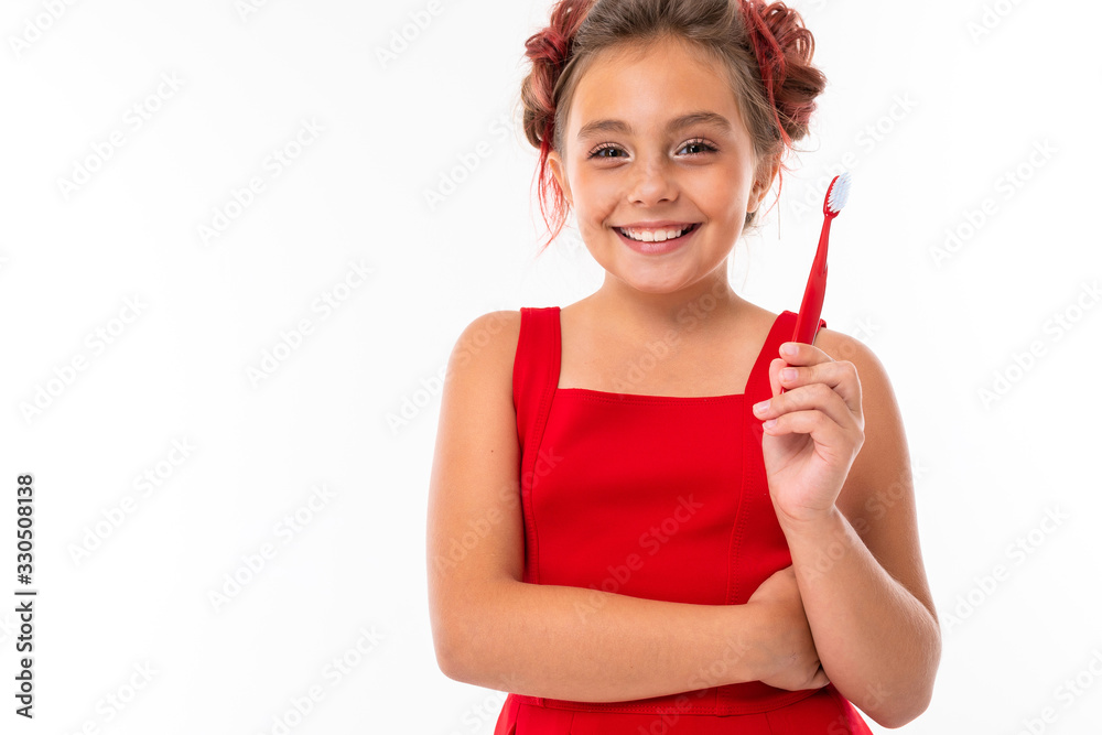 Little caucasian girl smiles isolated on white background