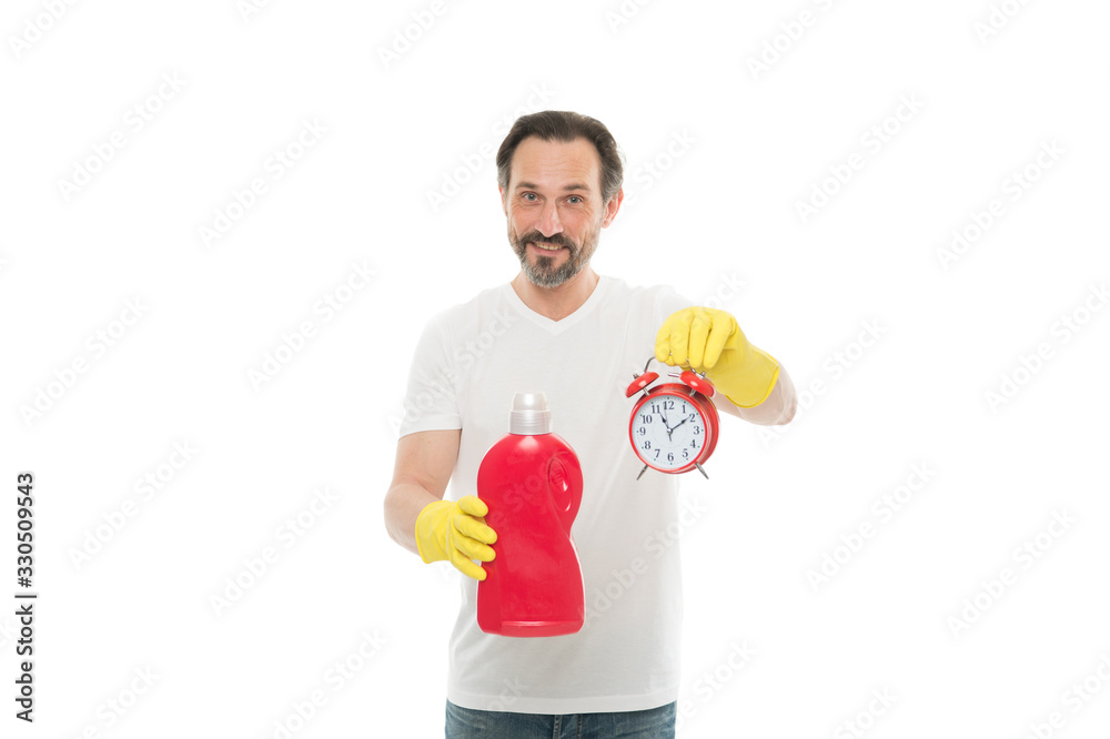 Easy and quickly. Save your time with this cleaning product. Man in rubber gloves hold bottle liquid soap chemical cleaning agent and clock. Bearded guy cleaning home. Cleanup concept. Faster Easy and quickly. Save your time with this cleaning product. Man in rubber gloves hold bottle liquid soap chemical cleaning agent and clock. Bearded guy cleaning home. Cleanup concept. Faster