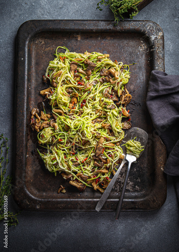 Vegetarian zukkini Pasta with mushrooms photo