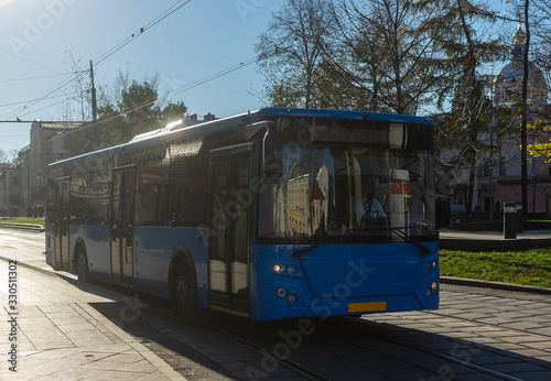 Blue regular bus on Novokuznetskaya street in Moscow.