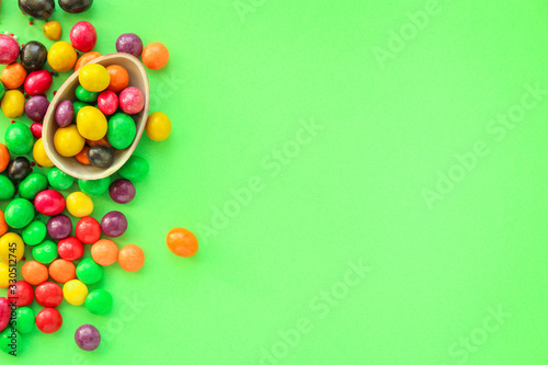 chocolate egg and candy easter decor, menu concept background. top view. copy space for text