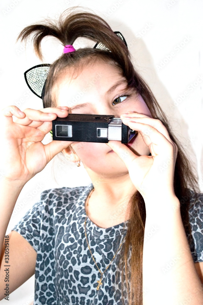 girl taking a narrow-film camera girl taking a narrow-film camera