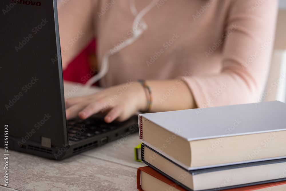 Girl student  a desk at home