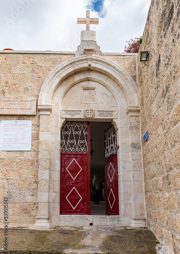 The entrance to the Greek Akeldama Monastery in the old city of Jerusalem in Israel photo