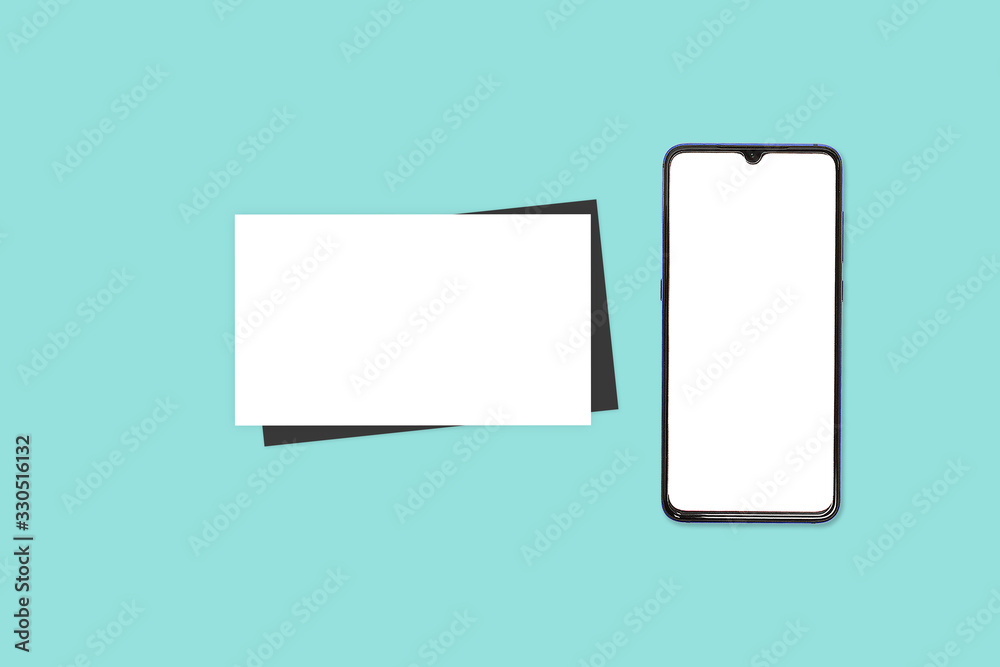 Phone and coffee on a blue background. Technology concept background. White screen phone copy space. Concept photos of desks / commercial backgrounds. Billboard background.