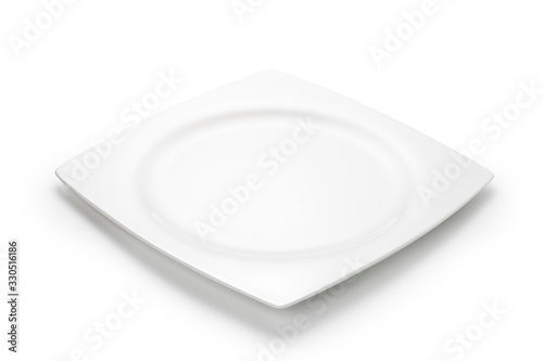 Empty white plate isolated on white background.