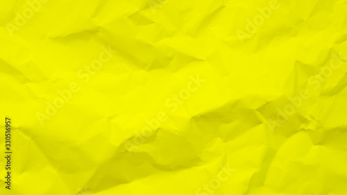 yellow paper background. crumpled yellow cardboard