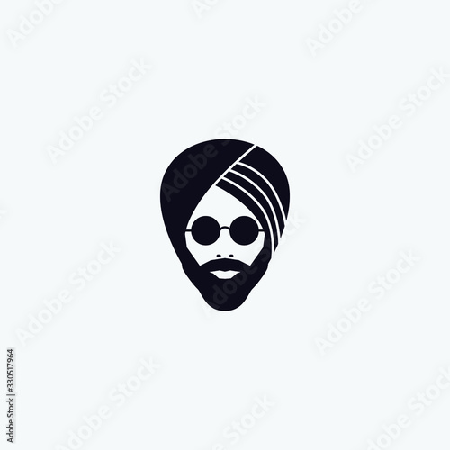 Canvas Print silhouette of a male head with a beard in a Sikh turban and glasses
