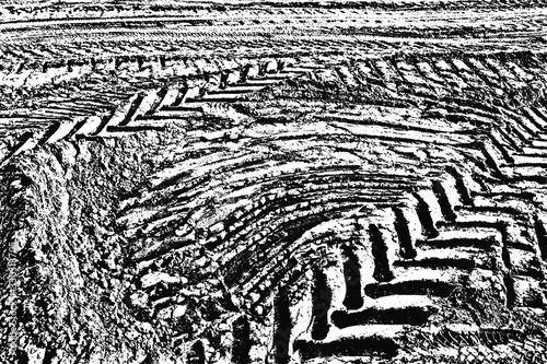 Grunge texture of vehicle wheel tracks on the ground. Overlay template. Vector illustration